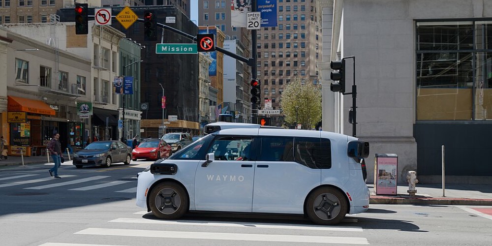 A Waymo Ojai vehicle in San Francisco in 2026. This photograph does not show the Toronto or Madrid trials.
